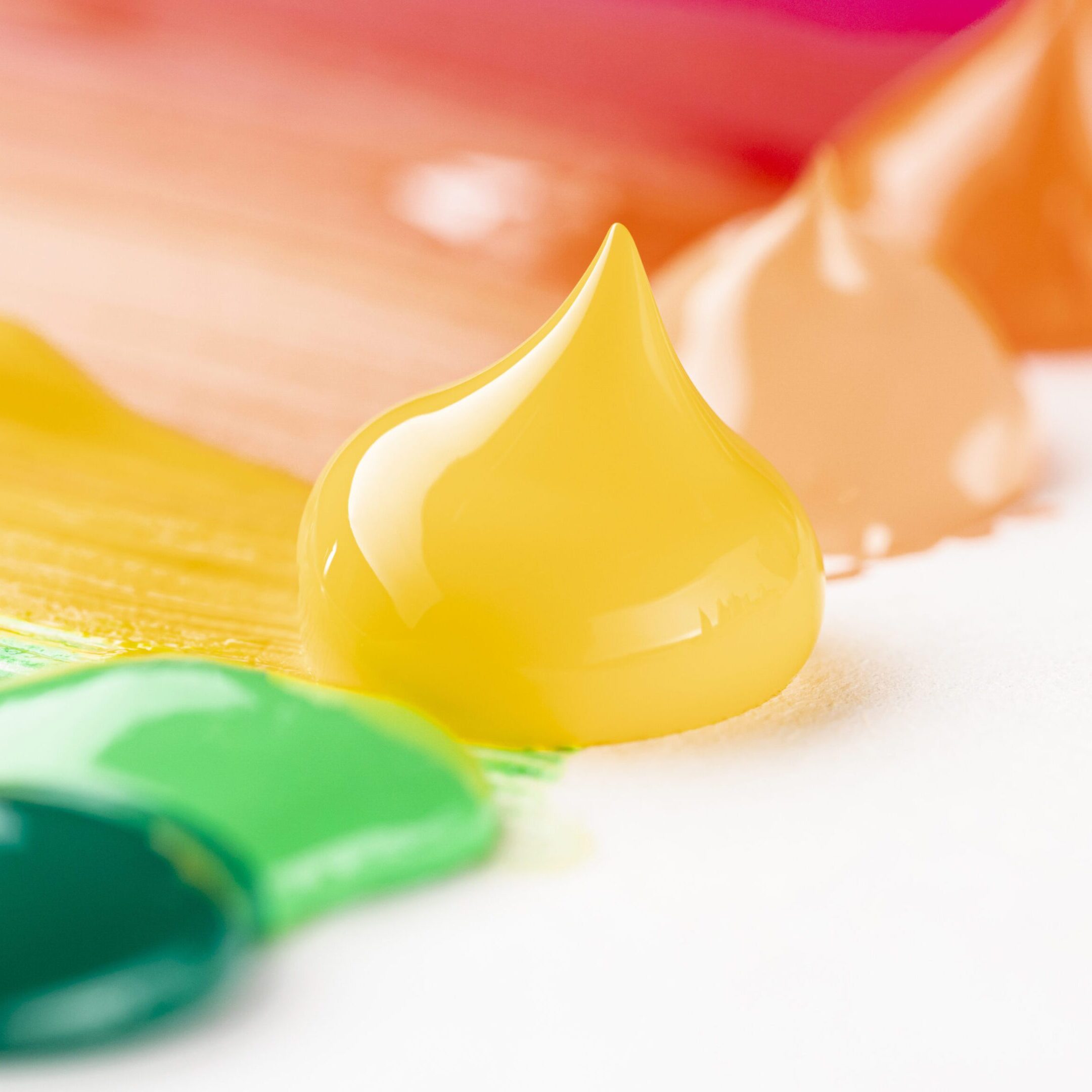 close-up-colorful-paint-white-table