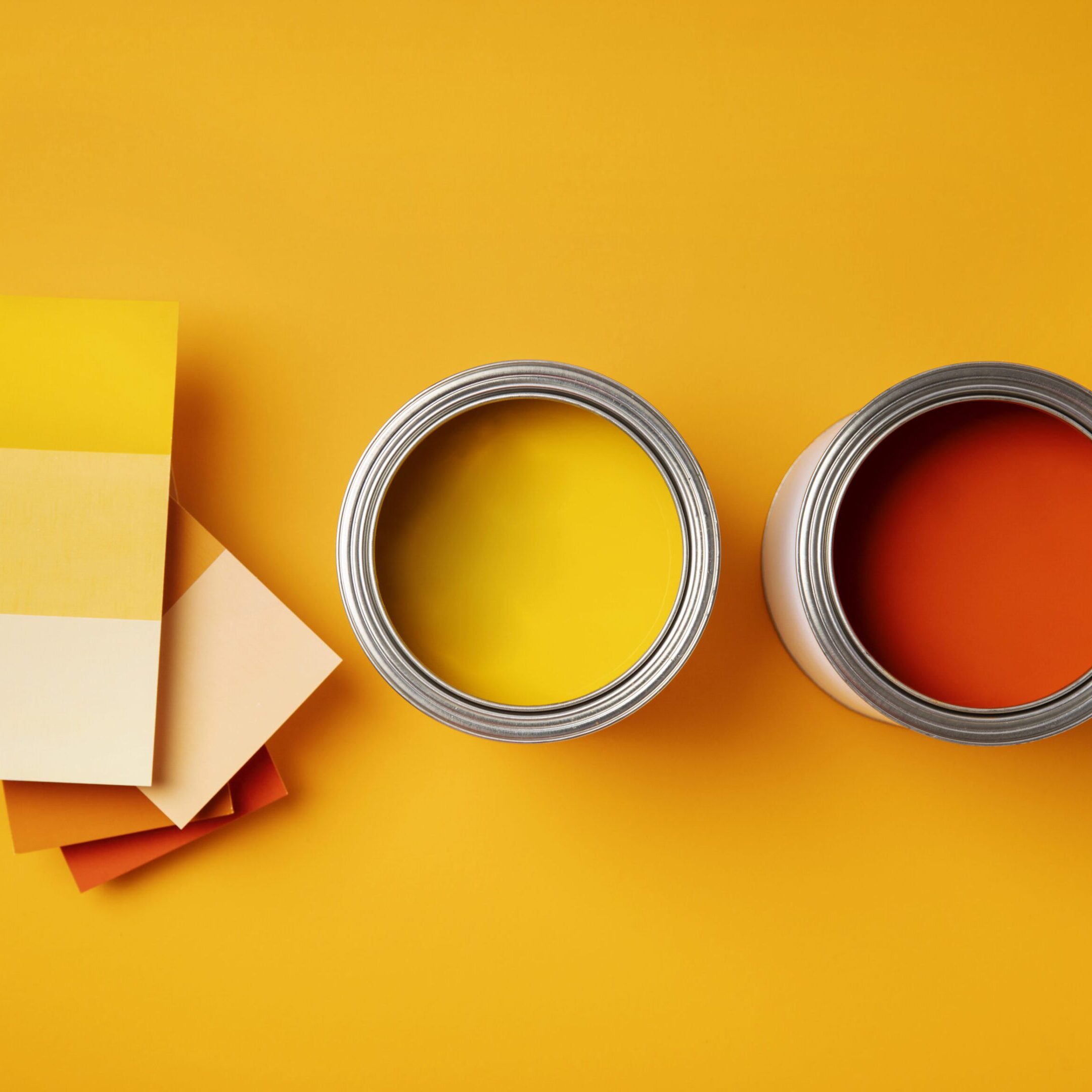 top-view-cans-with-orange-yellow-paint